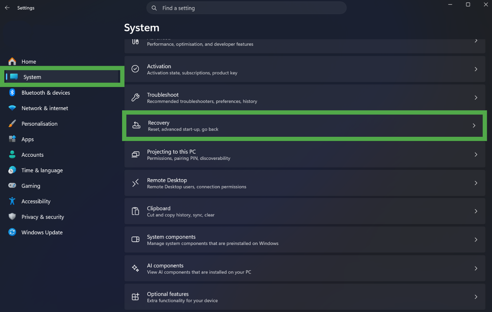 The Windows 11 Settings "System" menu, with the "Recovery" option highlighted in a green box.