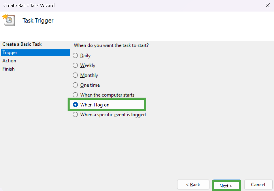The "Task Trigger" screen within the wizard, with the "When I log on" option selected and the "Next" button highlighted in a green box.