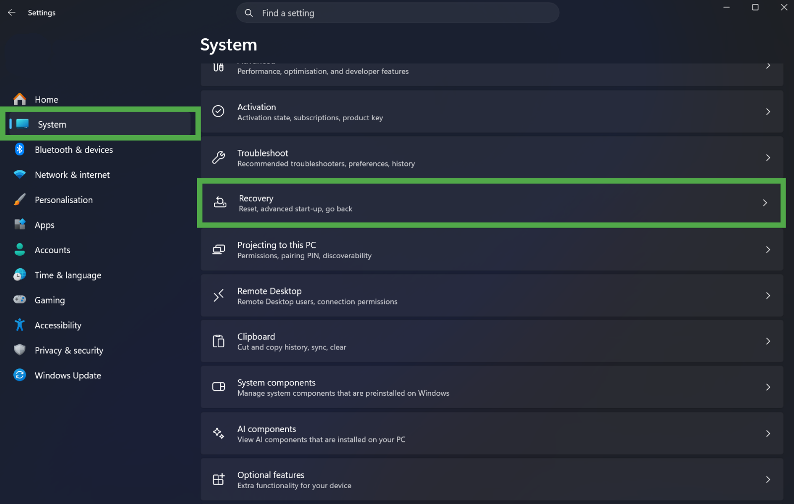 Windows "System" settings menu with the "Recovery" option highlighted in a green box.